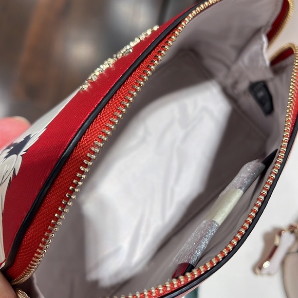 Kate Spade Disney X Kate Spade New York Cruella Makeup Bag
Red Multi - Picture 12 of 16